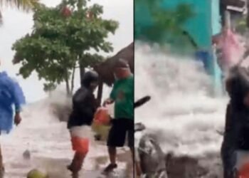 Ola gigante toca tierra y derriba a turistas