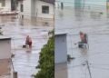 Abuelitos se aferran el uno al otro mientras esperan ser rescatados durante inundación en Poza Rica